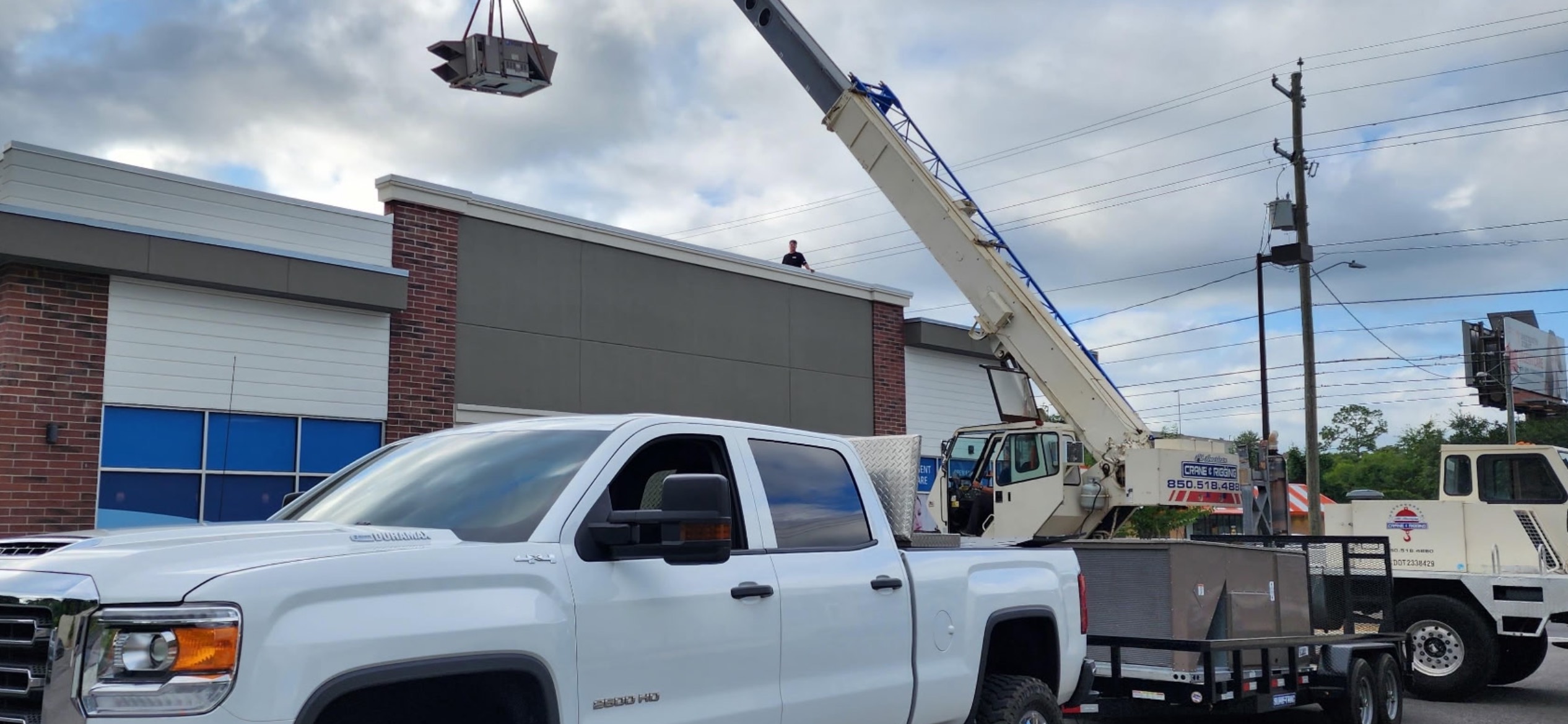 HVAC technician servicing an AC unit